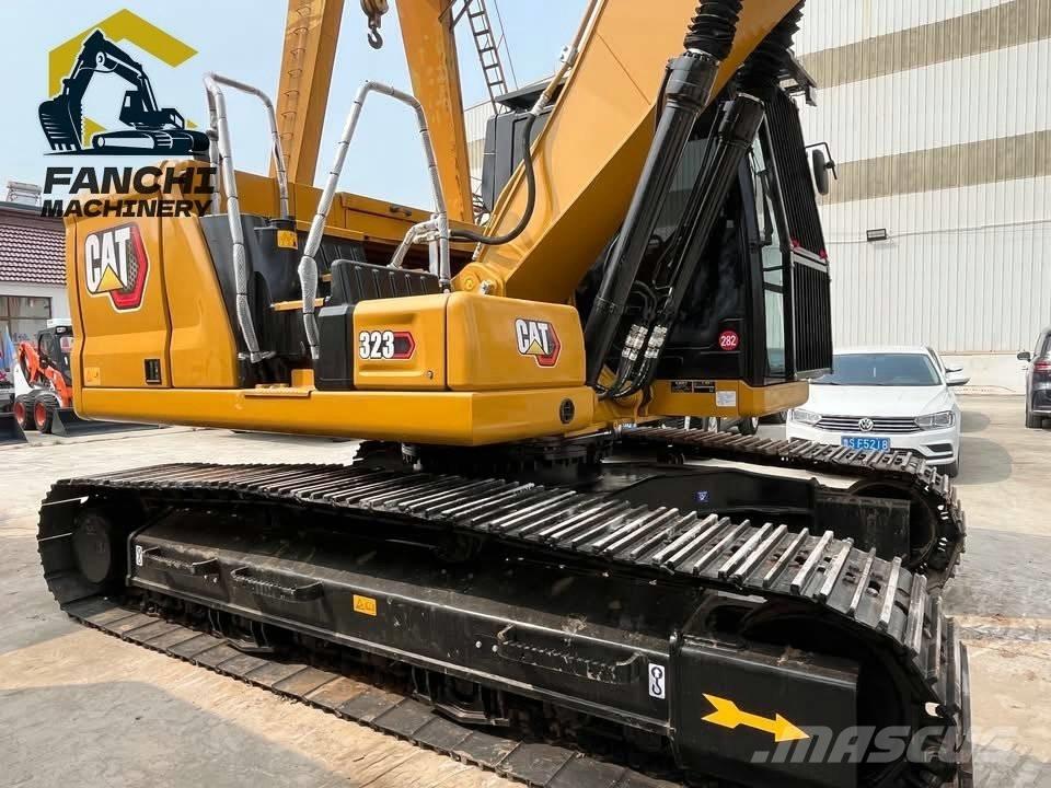 CAT 323 Kāpurķēžu ekskavatori