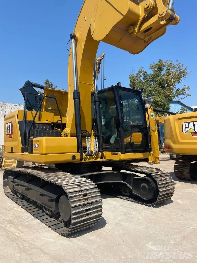 CAT 320 GC Ekskavatori uz riteņiem