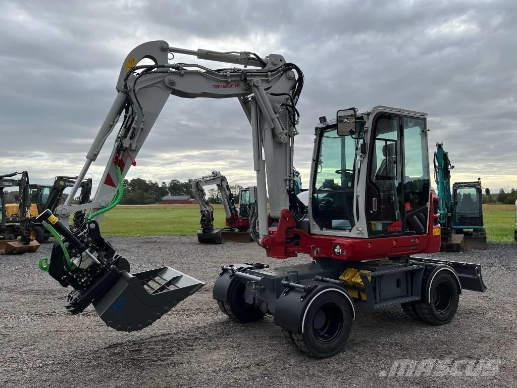 Takeuchi TB 370 W Ekskavatori uz riteņiem