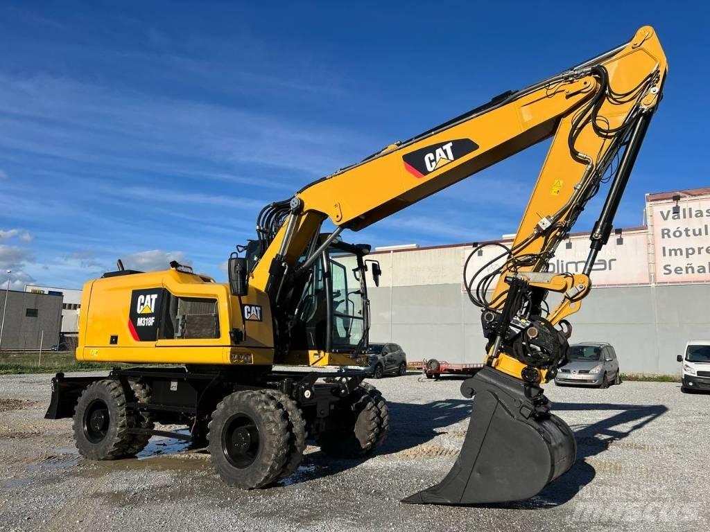 CAT M 318 F Ekskavatori uz riteņiem