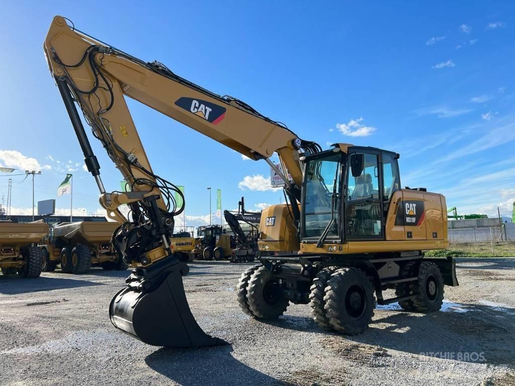 CAT M 318 F Ekskavatori uz riteņiem