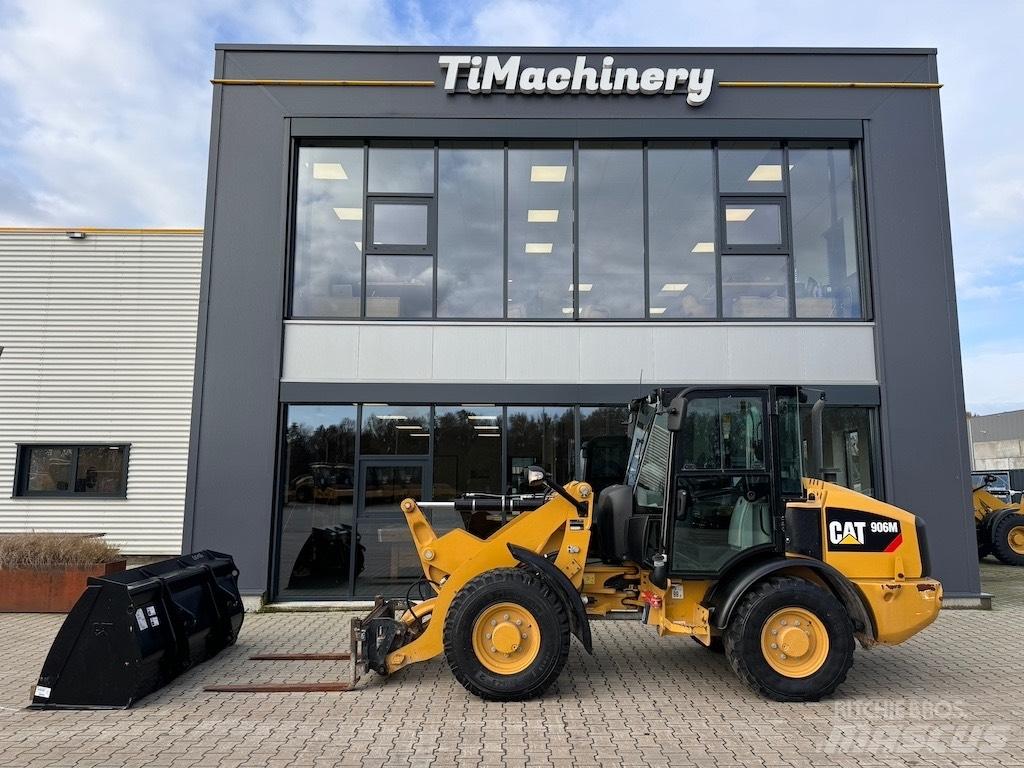 CAT 906M Iekrāvēji uz riteņiem