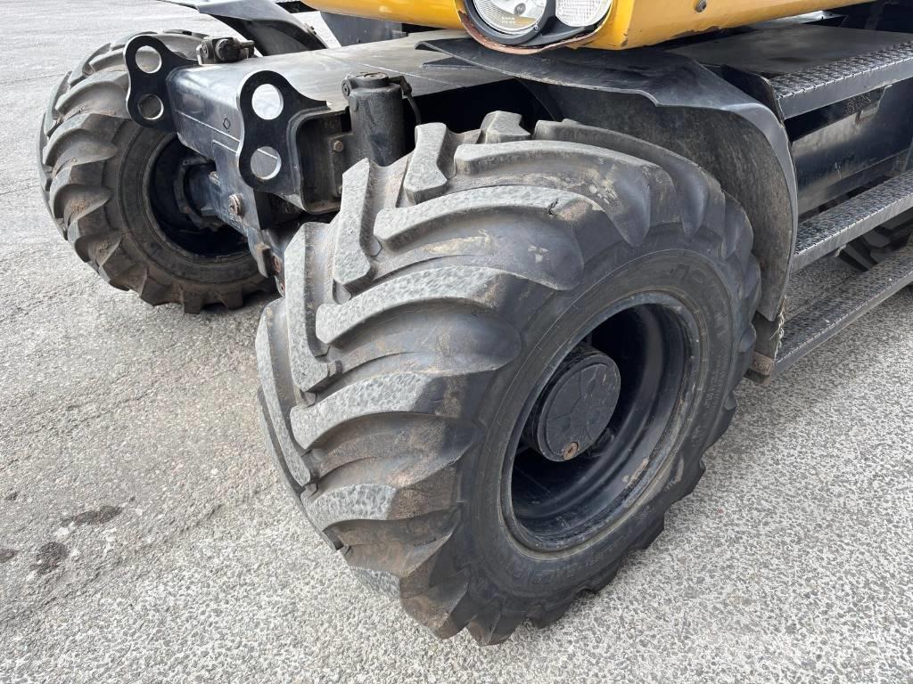 CAT M 313 D Ekskavatori uz riteņiem