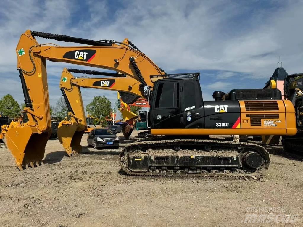CAT 330 D2 Vidēja lieluma ekskavatori 7 t - 12 t