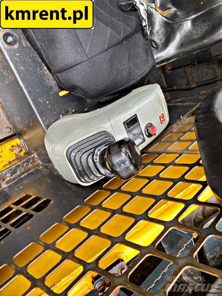 Komatsu SK 815 Lietoti riteņu kompaktiekrāvēji
