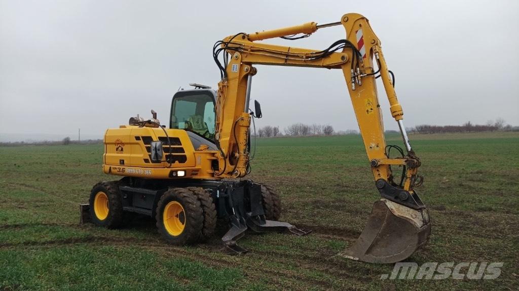 New Holland MH 3.6 Ekskavatori uz riteņiem