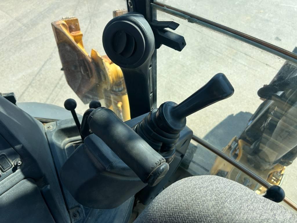 John Deere 310K Ekskavatori-iekrāvēji