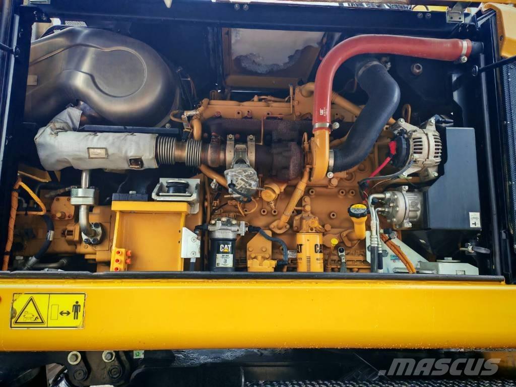 CAT M 318 F Ekskavatori uz riteņiem