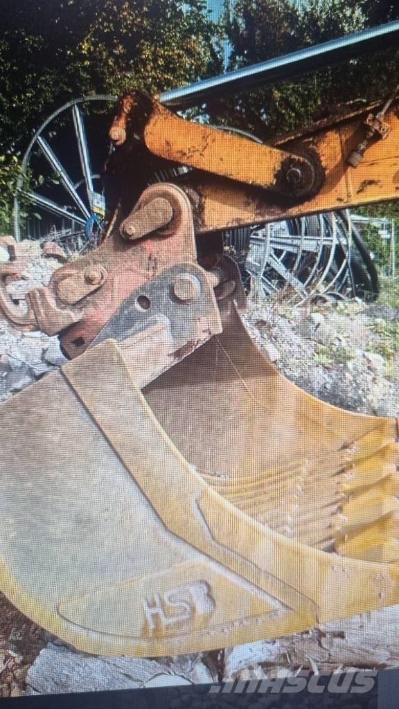CAT M 315 Ekskavatori uz riteņiem