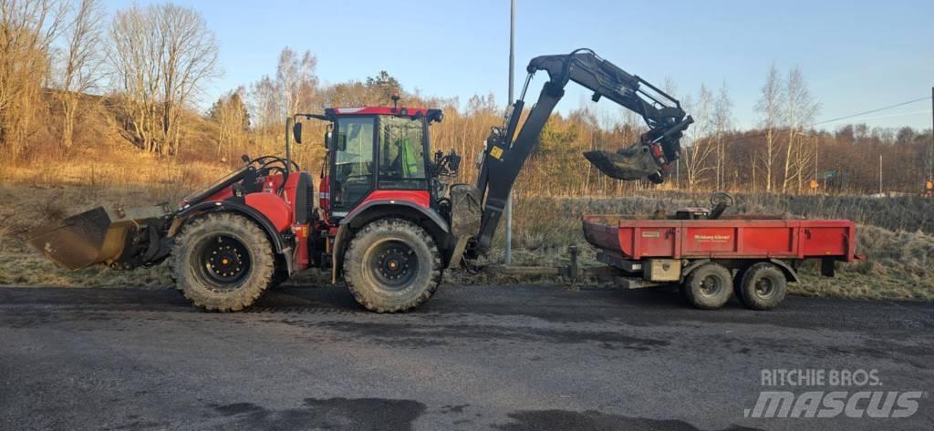 Huddig 1260 C Ekskavatori ar kausu priekšā