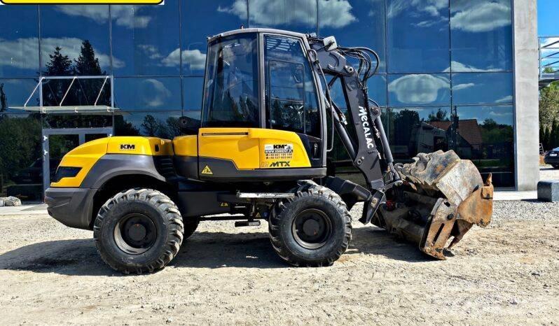 Mecalac 12 M TX Ekskavatori-iekrāvēji