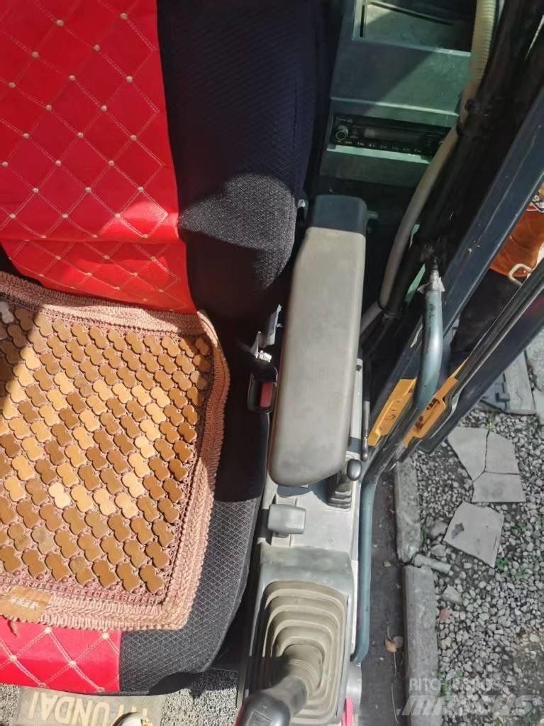 Hyundi 210w-9 Ekskavatori uz riteņiem