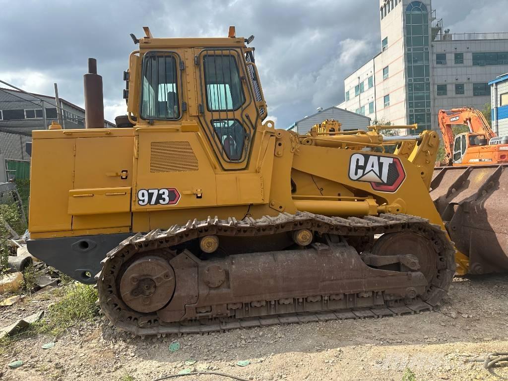 CAT 973 Kāpurķēžu iekrāvēji