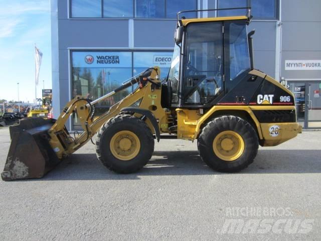 CAT 906 Iekrāvēji uz riteņiem