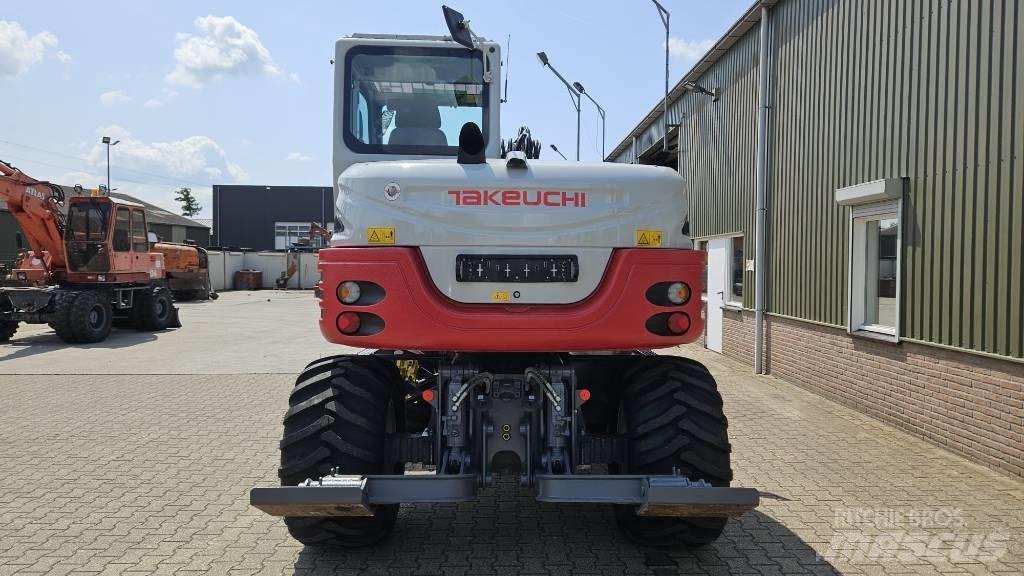 Takeuchi TB295W Ekskavatori uz riteņiem