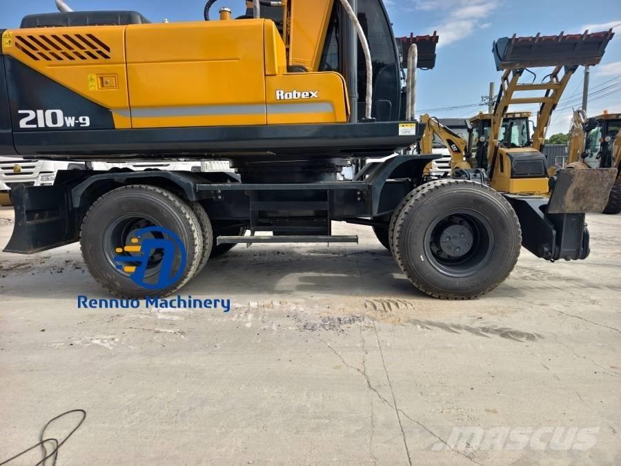 Hyundai 210W-9 Ekskavatori uz riteņiem