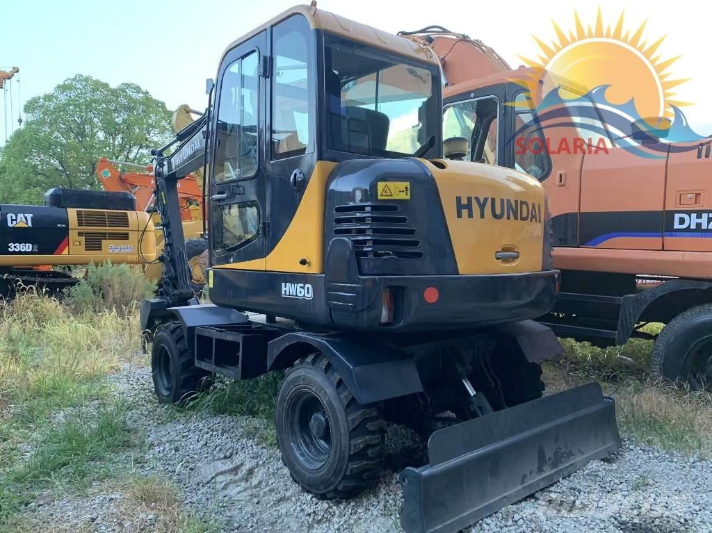 Hyundai R60W HW Ekskavatori uz riteņiem