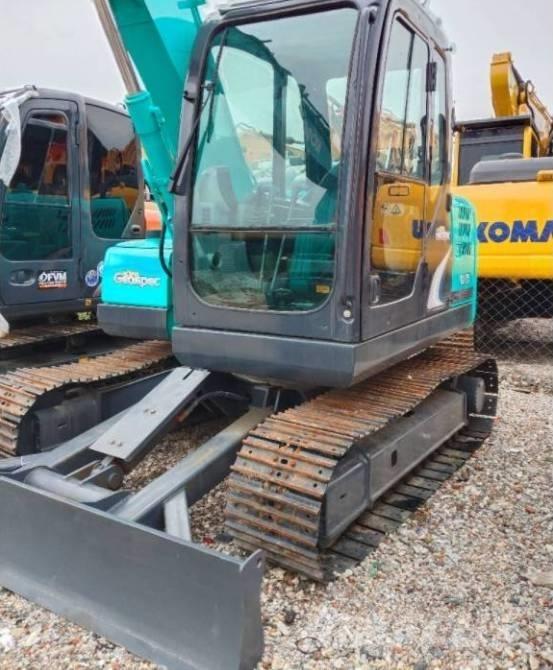 Kobelco SK 75 Vidēja lieluma ekskavatori 7 t - 12 t