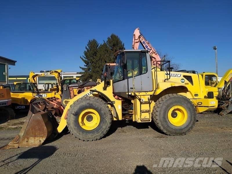New Holland W 190 Strēles un kausi
