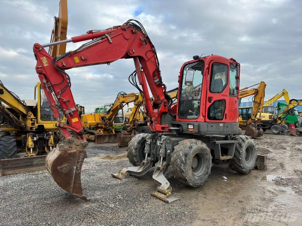 Komatsu PW98MR-8 Ekskavatori uz riteņiem