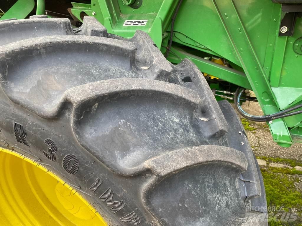 John Deere T560 HM Ražas novākšanas kombaini