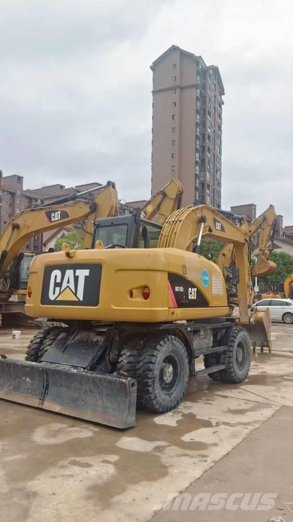CAT M 315 D Ekskavatori uz riteņiem