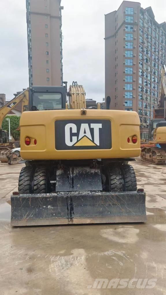 CAT M 315 D Ekskavatori uz riteņiem