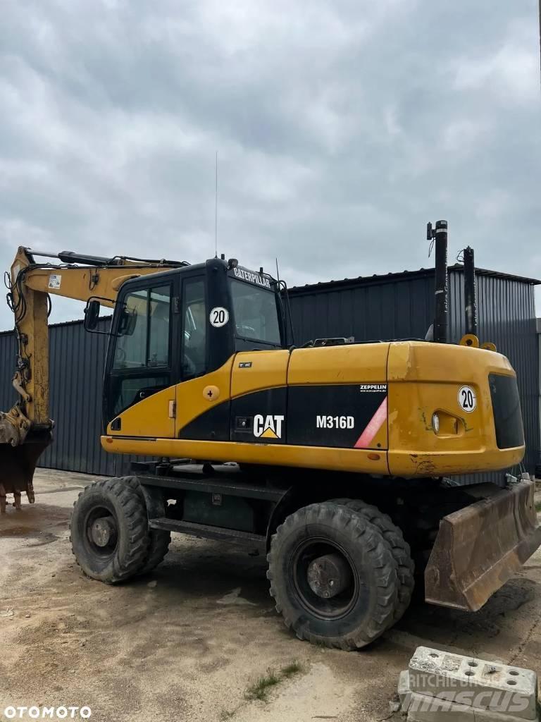 CAT M 316 D Ekskavatori uz riteņiem