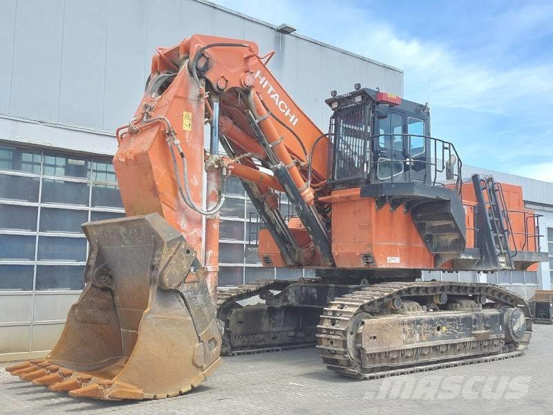 Hitachi EX 1200-6 Ekskavatori ar kausu priekšā