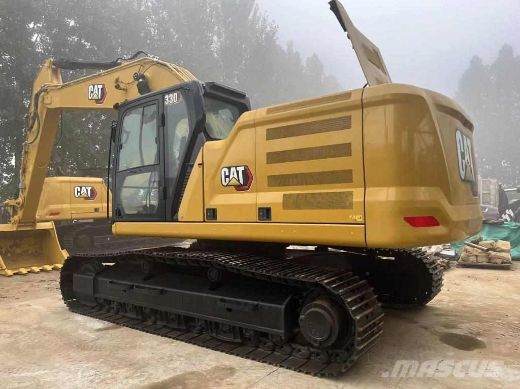 CAT 2021 CAT 330 Ekskavatori uz riteņiem