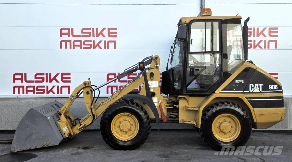 CAT 906 Iekrāvēji uz riteņiem