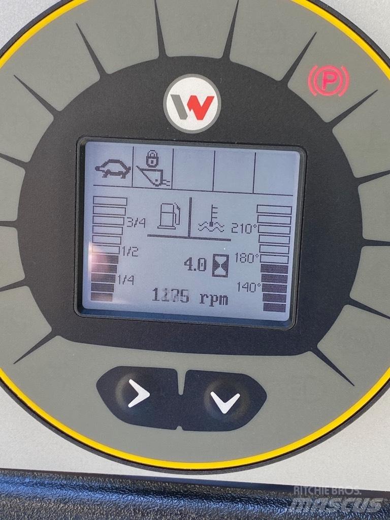 Wacker Neuson SW21 Lietoti riteņu kompaktiekrāvēji