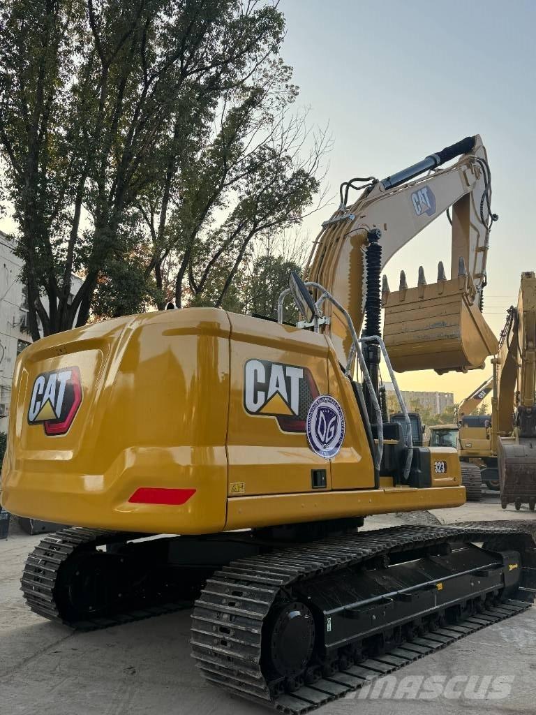 CAT CAT323 Vidēja lieluma ekskavatori 7 t - 12 t