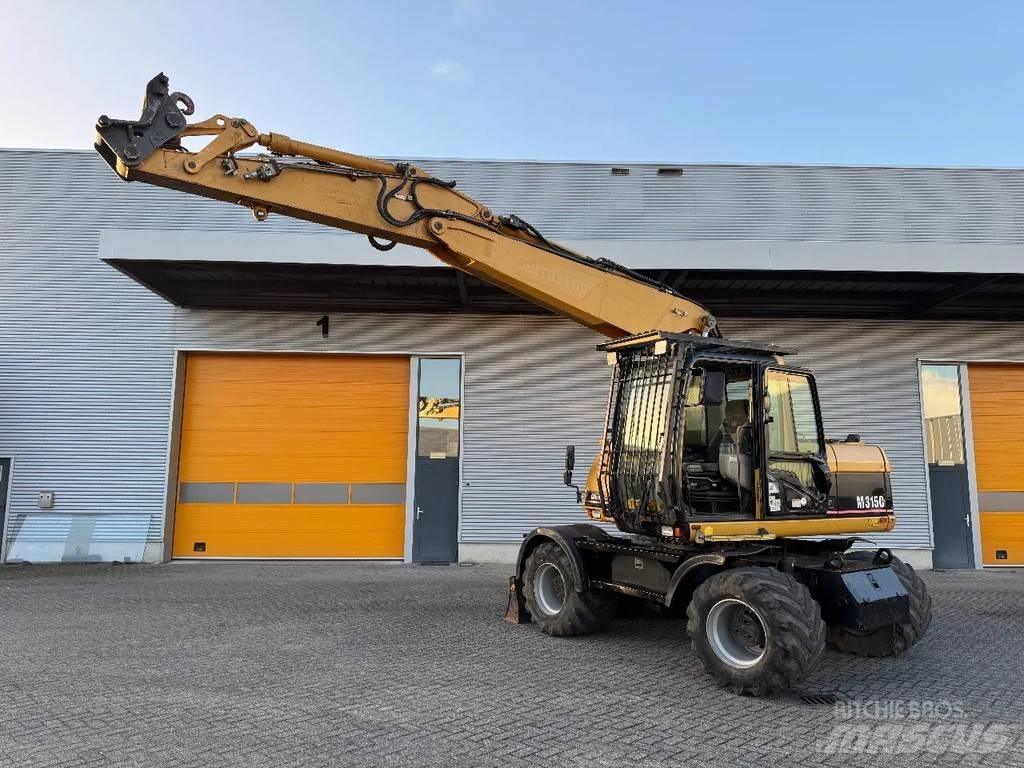 CAT M315C Ekskavatori uz riteņiem
