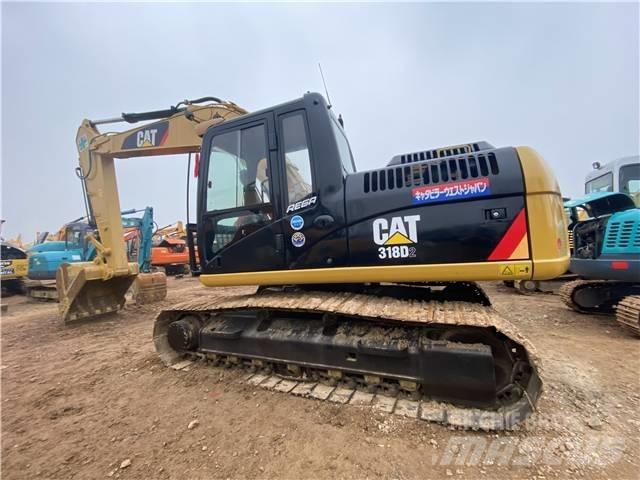 CAT 318D2 Kāpurķēžu ekskavatori
