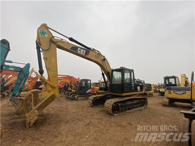CAT 318D2 Kāpurķēžu ekskavatori
