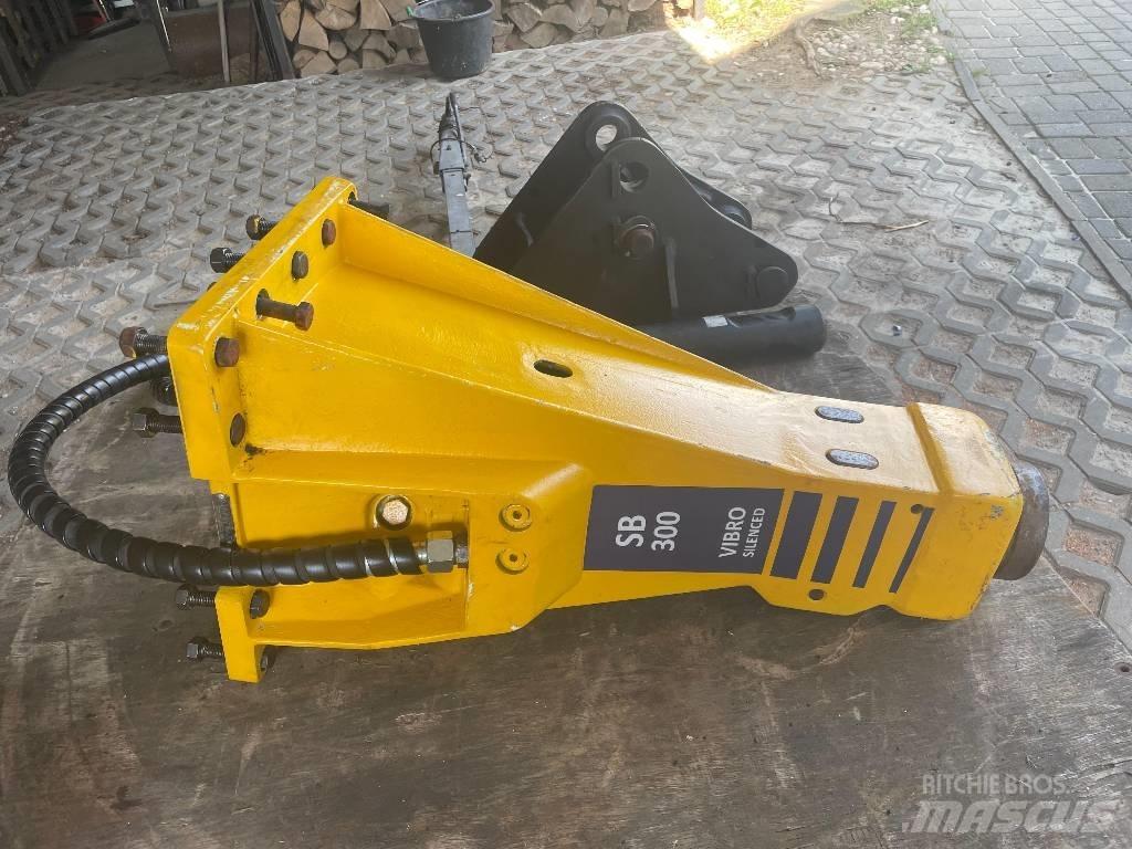 Atlas Copco SB 300 Āmuri/Drupinātāji