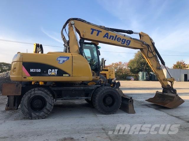 CAT M 315 D Ekskavatori uz riteņiem