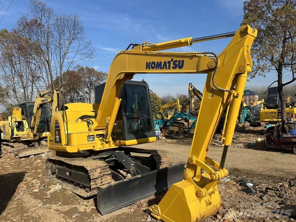 Komatsu PC 70 Vidēja lieluma ekskavatori 7 t - 12 t