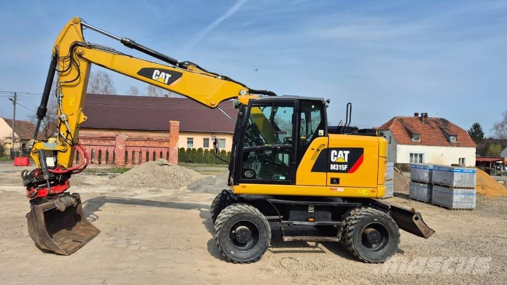 CAT M 315 F Ekskavatori uz riteņiem