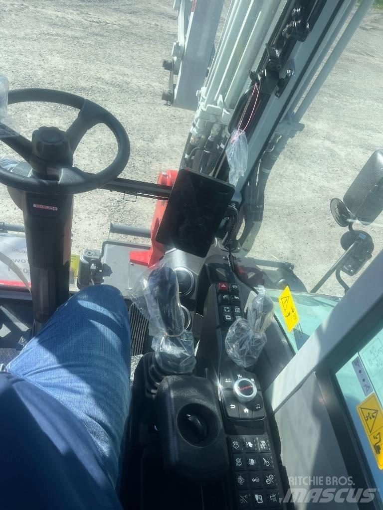 Takeuchi TB 370 W Ekskavatori uz riteņiem
