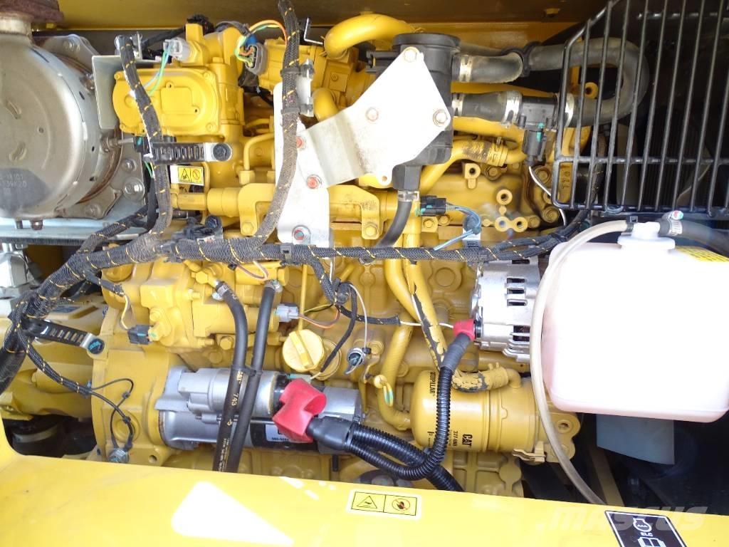CAT 310 Vidēja lieluma ekskavatori 7 t - 12 t