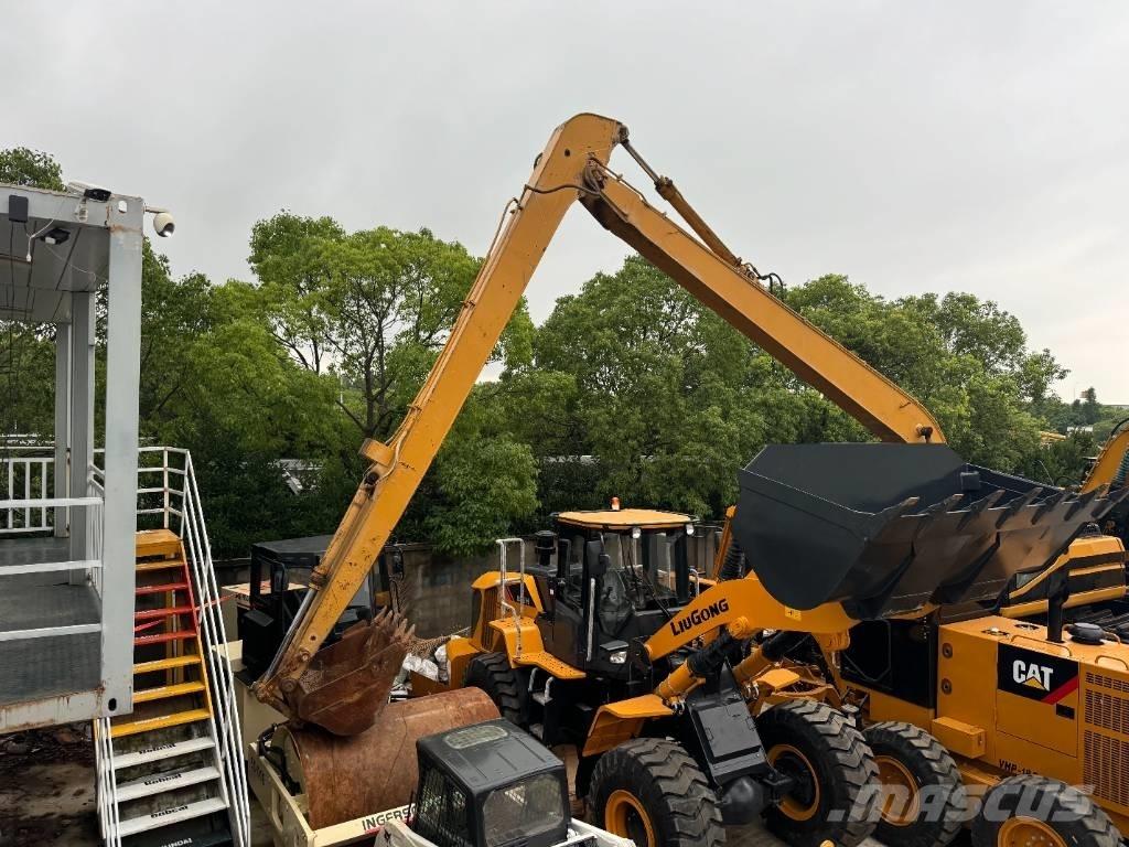 CAT 320 B Amfībijas tipa ekskavatori