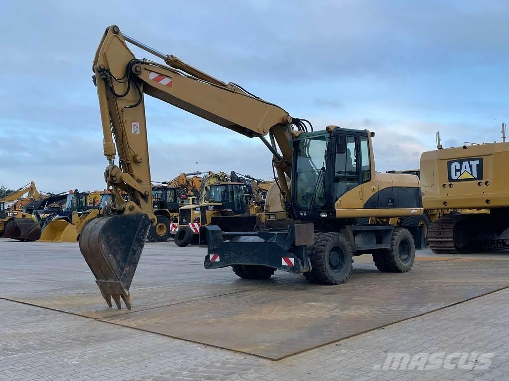 CAT M318C Īpašie ekskavatori