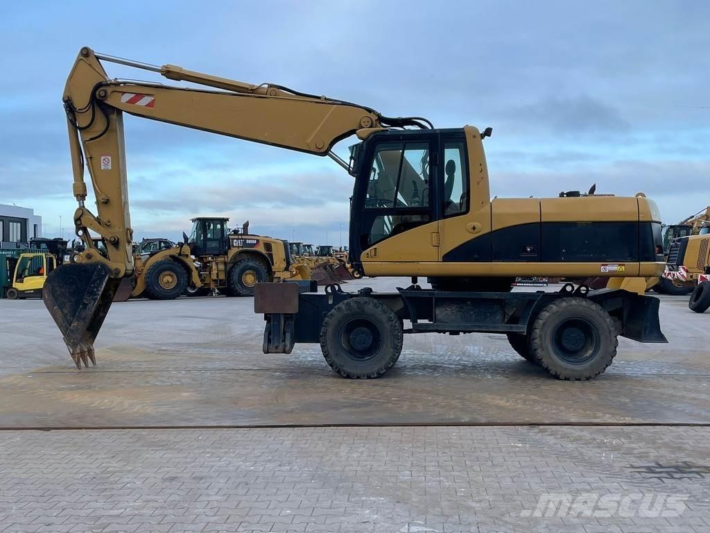 CAT M318C Īpašie ekskavatori