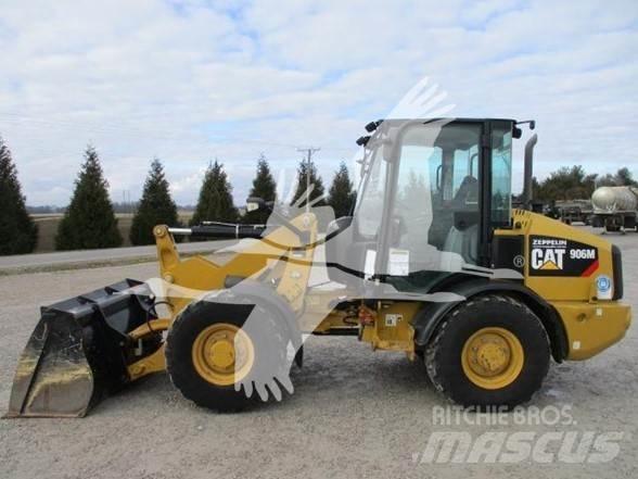 CAT 906M Iekrāvēji uz riteņiem