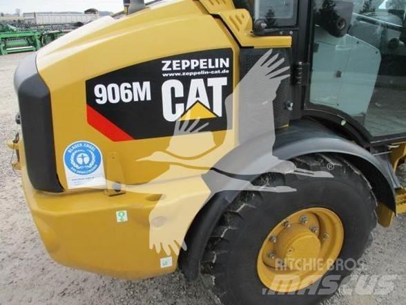 CAT 906M Iekrāvēji uz riteņiem