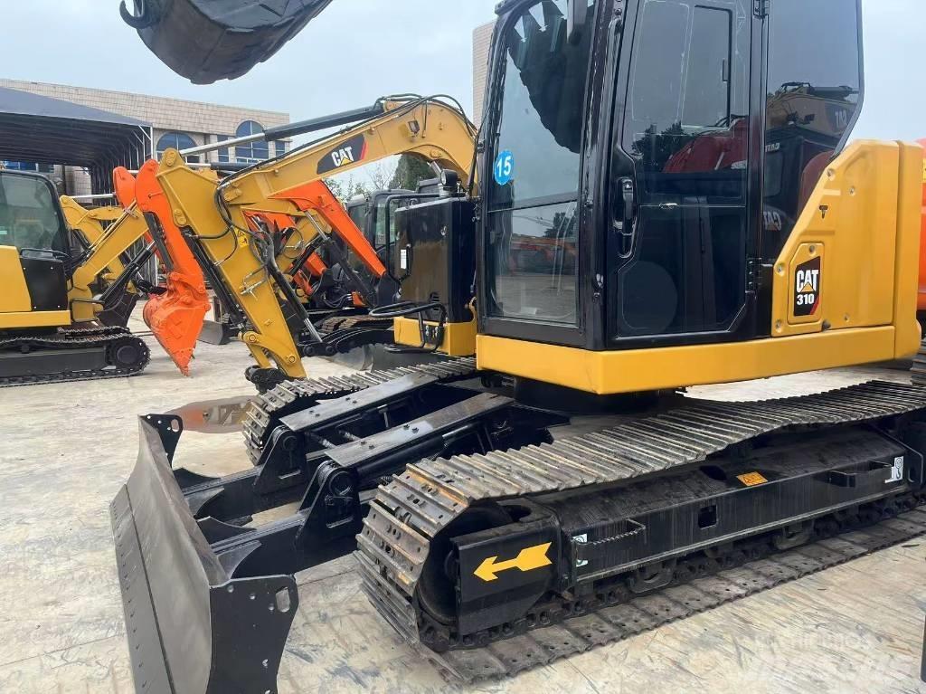CAT 310 Kāpurķēžu ekskavatori