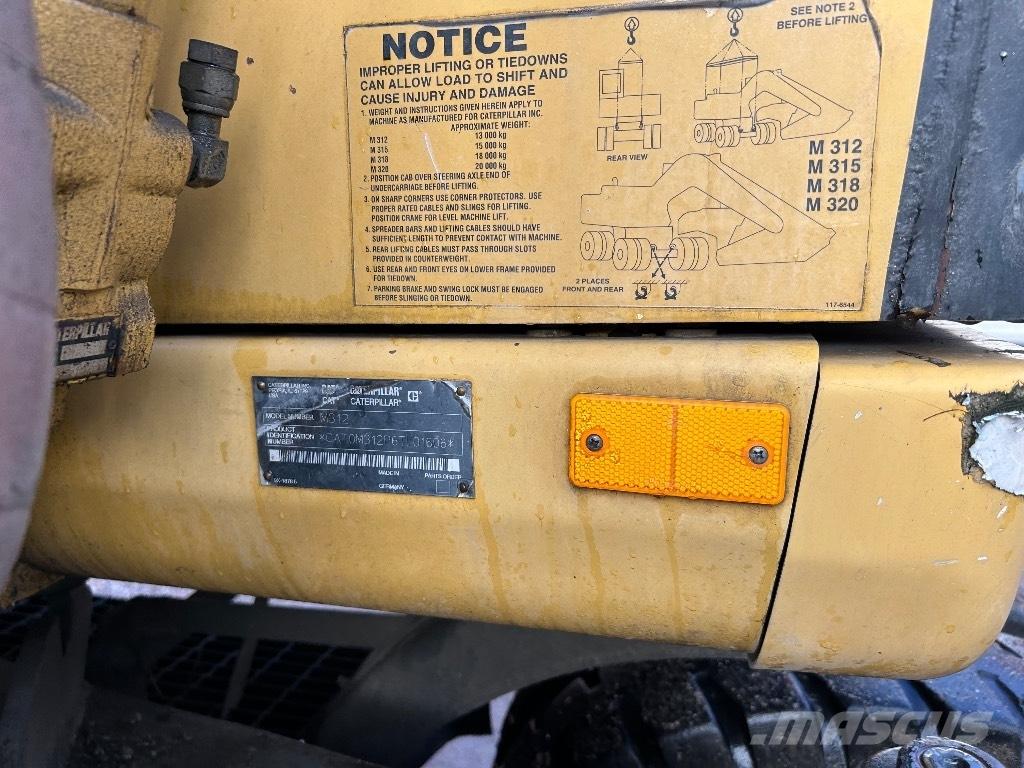 CAT M312 Iekrāvēji uz riteņiem