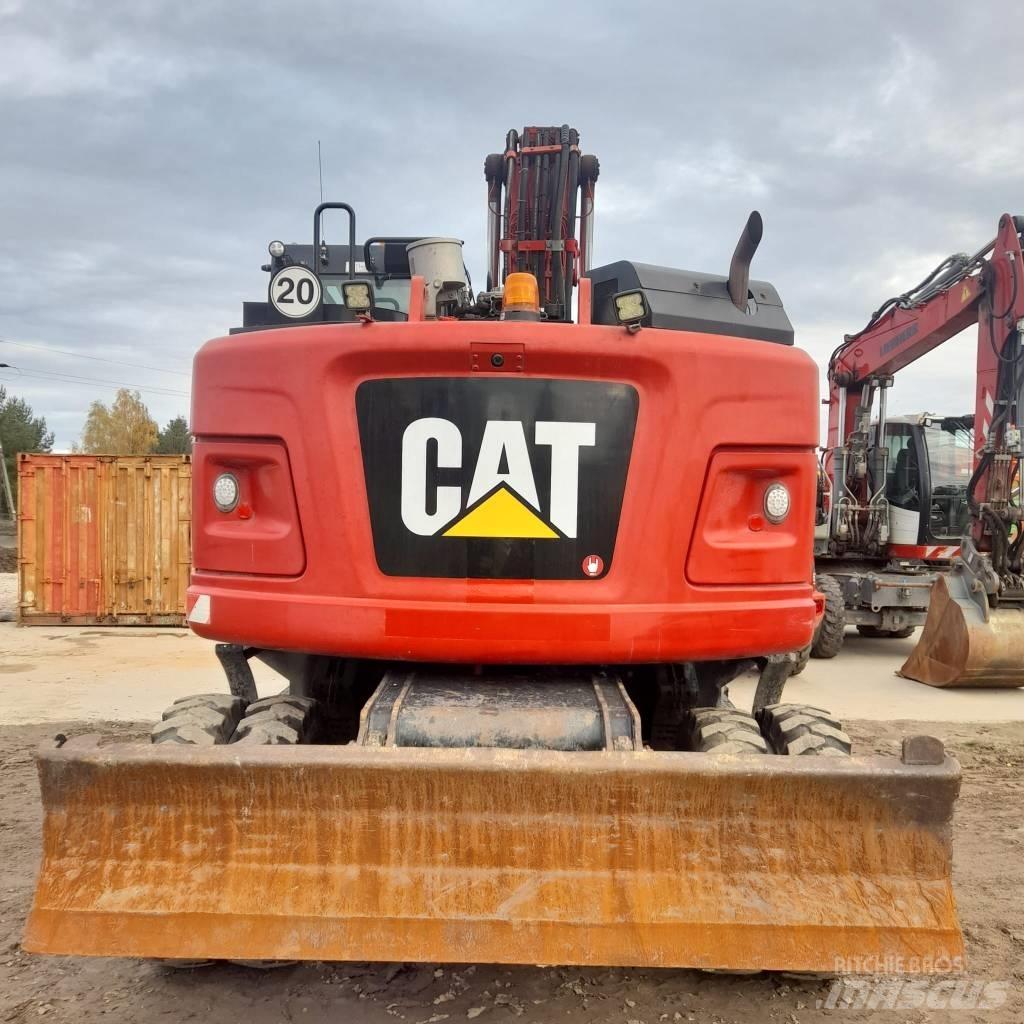 CAT M317 Ekskavatori uz riteņiem